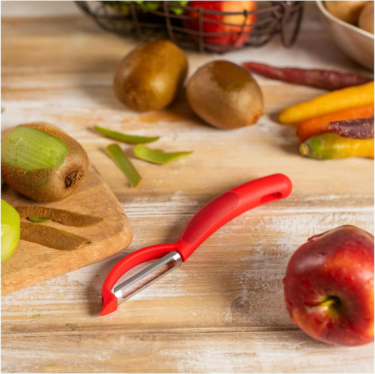 Kuhn Rikon Serrated Piranha “Swivel” Peeler 7.25” Red